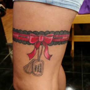 garter bow thigh tattoo 6